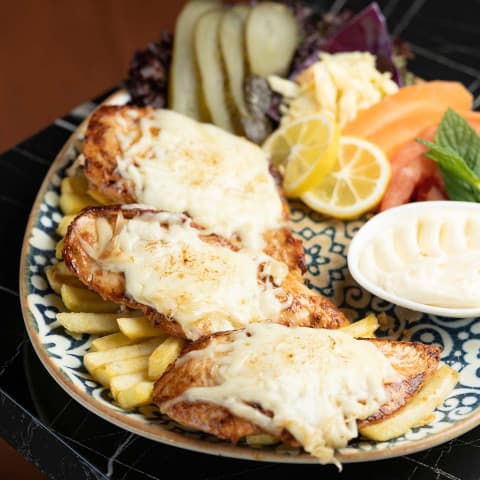 Chicken cutlets extinguished with kashkaval