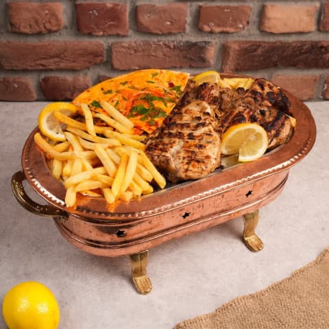 Charcoal grilled chicken with potatoes