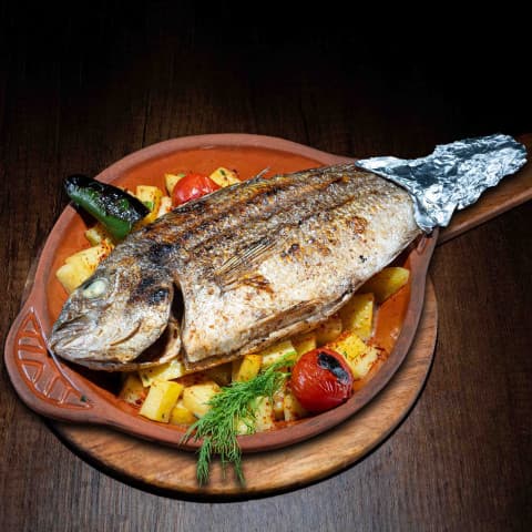 فخارة سمك مع بطاطا