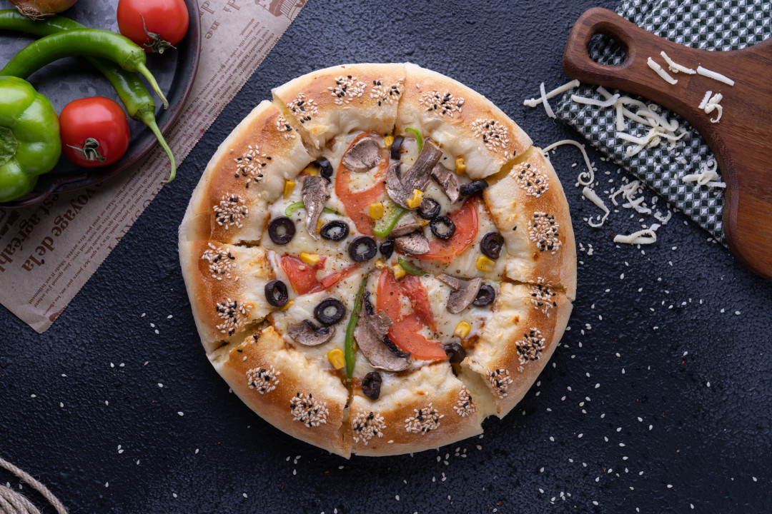 orta Al Muallim Pizza